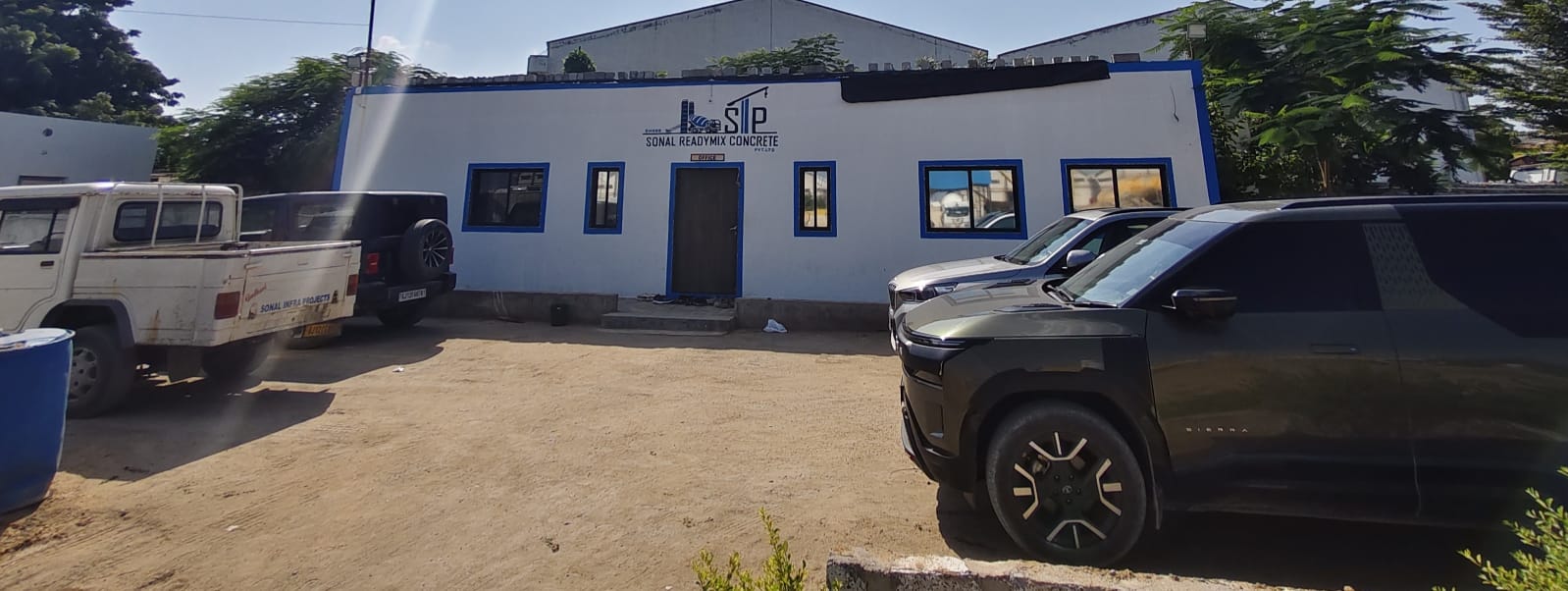 Office building with the Shree Sonal Readymix Concrete name on the wall